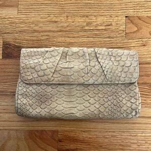 LAUREN MERKIN gold embossed python clutch
